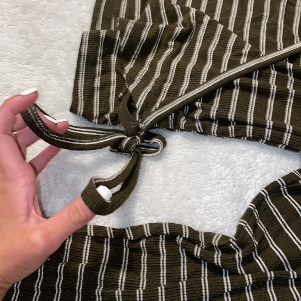 Forever 21 stripper long sleeve with tie at bottom left. - Picture 2 of 3